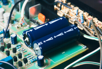 Non polarized capacitor on electronic circuit board and component of electrical appliance