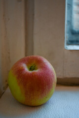 apples in a glass bowl