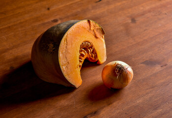 object photography an onion and a pumpkin orange
