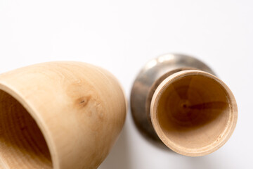 wooden objects with metal ring on white
