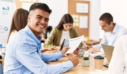 Group of business workers smiling happy working at the office.