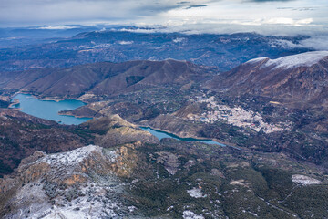 Aerial landscape shot of a snowy Sierra Nevada mountains Granada, Andalucia, Spain