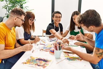 Group of people drawing at art studio.