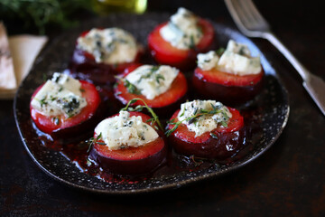 Baked plums with blue cheese and thyme. Healthy snack. Keto food. 