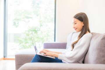 Portrait beautiful young asian woman use laptop for working