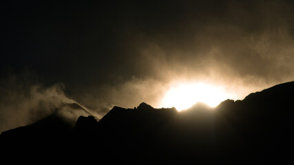 Snow and Wind on mountain peaks, Lone Pine Desert, California