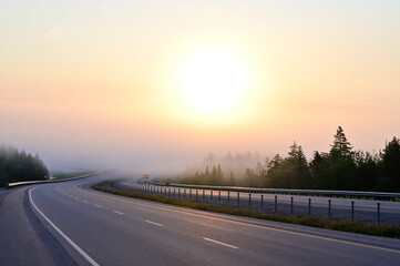 Highway in the early morning at sunrise