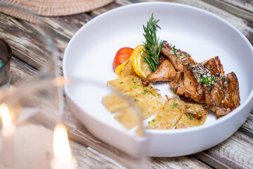 Pollo Alla Graiglia grilled chicken with baked potatoes