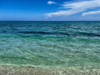turquoise waves crashing on the beach