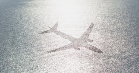 Travel concept - An passenger airplane shadow flying towards a tropical Oludeniz beach