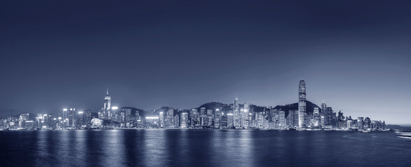 Naklejka premium Night scenery of panorama of Victoria harbor of Hong Kong city