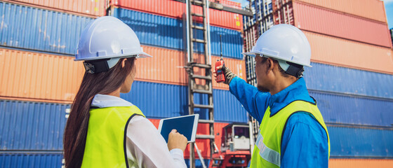 Banner photo of Conceptual image of logistics business, Engineer with Forklift truck lifting cargo...