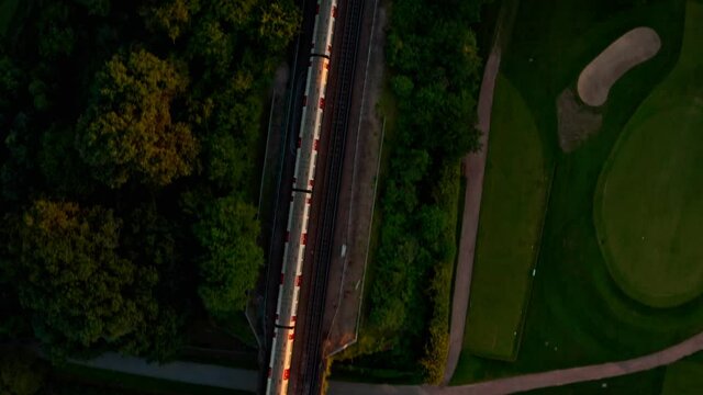 Top down drone shot following London underground train