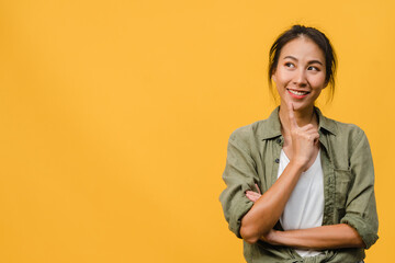Portrait of young Asia lady with positive expression, arm crossed, smile broadly, dressed in casual...