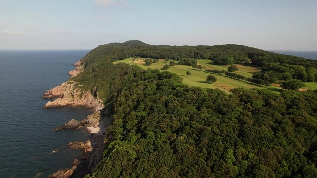 Aerial view of cliff coast with golf course, Kullaberg, Sweden