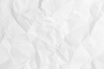 White crumpled paper texture background.