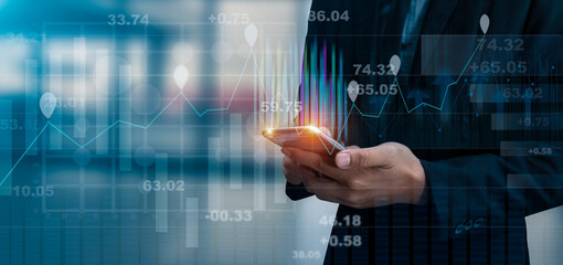 Businessman hands working on network and digital finance marketing chart with future technology innovation and digital transformation concept.