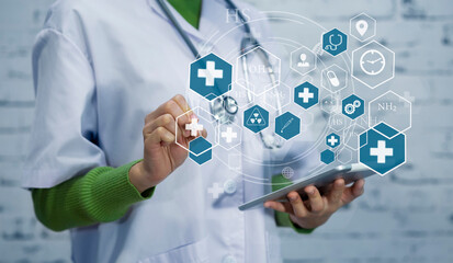 Medicine doctor using digital healthcare and network connection on hologram modern virtual screen...