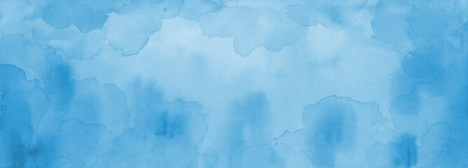Fototapeta na wymiar Light pastel blue watercolor background texture, painted blue blotches on the border