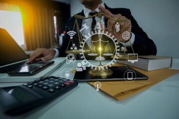 Concepts of Law and Legal services. Lawyer working with law interface icons. Blurred background.	
