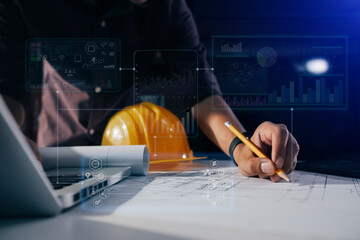 Construction and structure concept, engineer working with digital tablet computer and meeting for project working with partner on model building, technology network interface icons. 