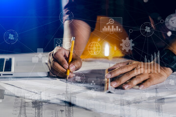 Construction and structure concept, engineer working with digital tablet computer and meeting for project working with partner on model building, technology network interface icons. 