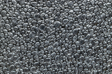 Black grain background. Gray wall for board background. Grey styrofoam foam texture or white...