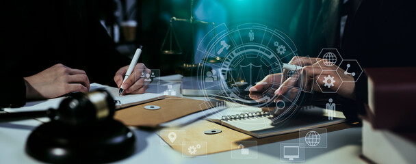 Concepts of Law and Legal services. Lawyer working with law innovation interface icons. Blurred background.	