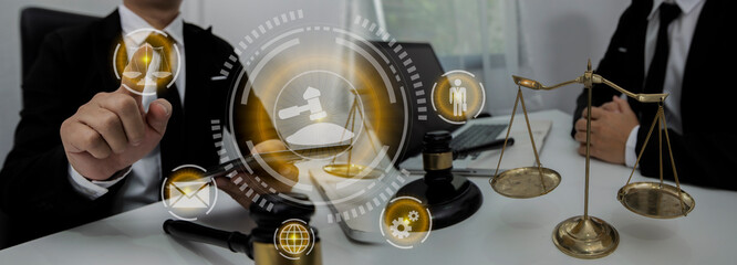Concepts of Law and Legal services. Lawyer working with law interface icons. Blurred background.	