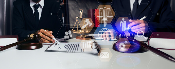 Concepts of Law and Legal services. Lawyer working with law interface icons. Blurred background.	