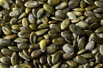 Close up of pumpkin seeds for texture background.