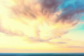 Colorful cloudy sky at sunset. Gradient color. Sky texture. Abstract nature background