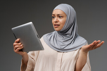 Portrait of a mature islamic woman wearing hijab