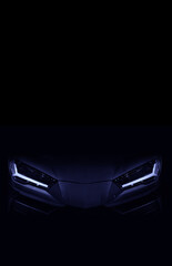 Fototapeta na wymiar Silhouette of black sports car with LED headlights on black background, copy space