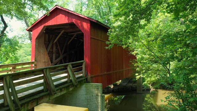 Red covered bridge aerial view
