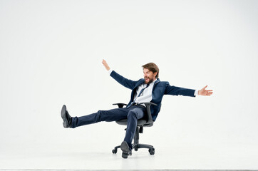 Cheerful man lies in an entertainment chair