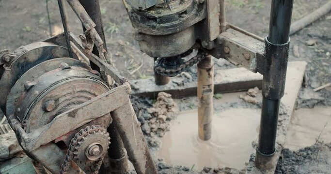 Drilling rig drills well for water extraction