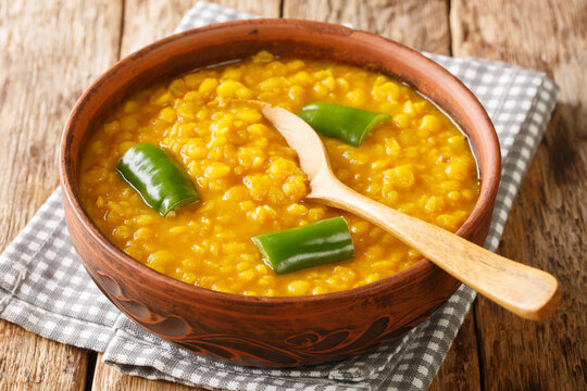 Ethiopian Yellow Split Peas Curry Kik Alicha closeup in the bowl on the table. Horizontal