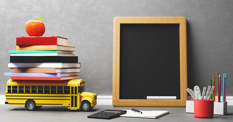 Back to school. Empty blackboard and stationery