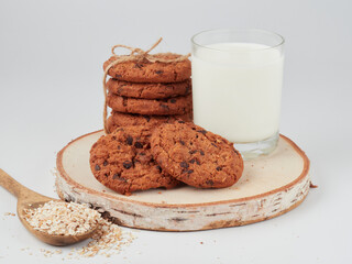 Chocolate cookies with milk. Sweet cookies. Homemade cookies. Delicious breakfast.