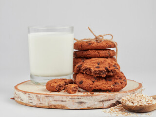 Chocolate cookies with milk. Sweet cookies. Homemade cookies. Delicious breakfast.