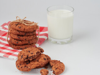 Chocolate cookies with milk. Sweet cookies. Homemade cookies. Delicious breakfast.