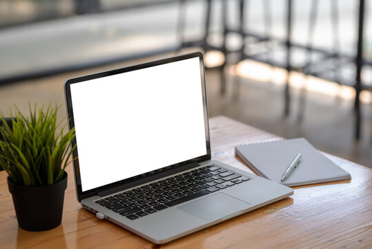 Workspace tablet blank white screen with placed at the office. Mock up.