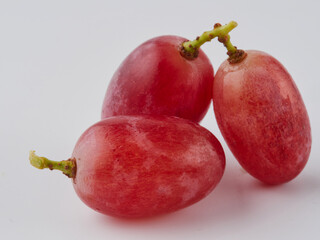 Grapes. Red grape. Grape branch isolated on white. With clipping path. Full depth of field.