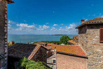 Beautiful view of Lake Trasimeno and the islands, from the historic center of Passignano, Italy