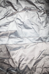 Crumpled aluminum foil background.
