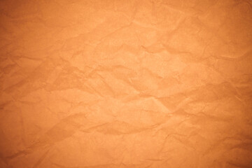 Crumpled brown paper background.