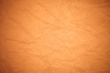 Fototapeta premium Crumpled brown paper background.