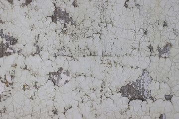 The texture of a worn out, old concrete wall.