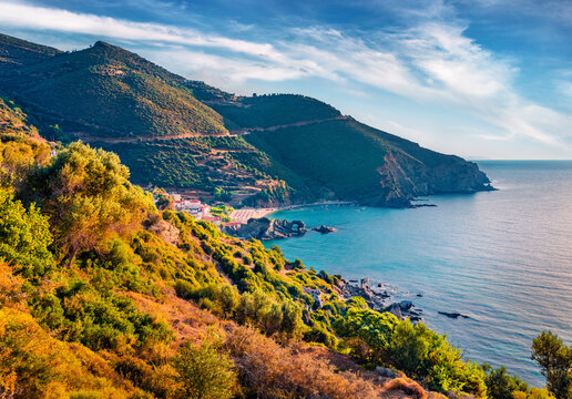 Aerial morning view of Kama beach and Kalamos village. Breathtaking outdoor scene of Euboea island, Greece, Europe. Exciting summer seascape of Aegean sea. Beauty of nature concept background..